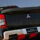 Illustration for article titled The Mitsubishi Triton Absolute Will Not Apologize for All That Carbon Fiber